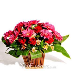 Table Arrangement Of Red Roses & Pink Gerberas 